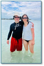 A person and person standing in water

AI-generated content may be incorrect.